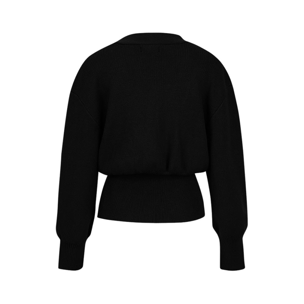 Strickjacke mit ungewöhnlichen Knöpfen