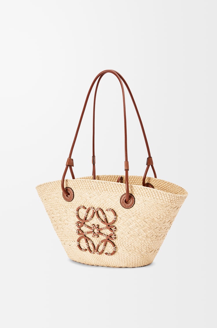 Strohtasche mit Lederhenkeln und Logo